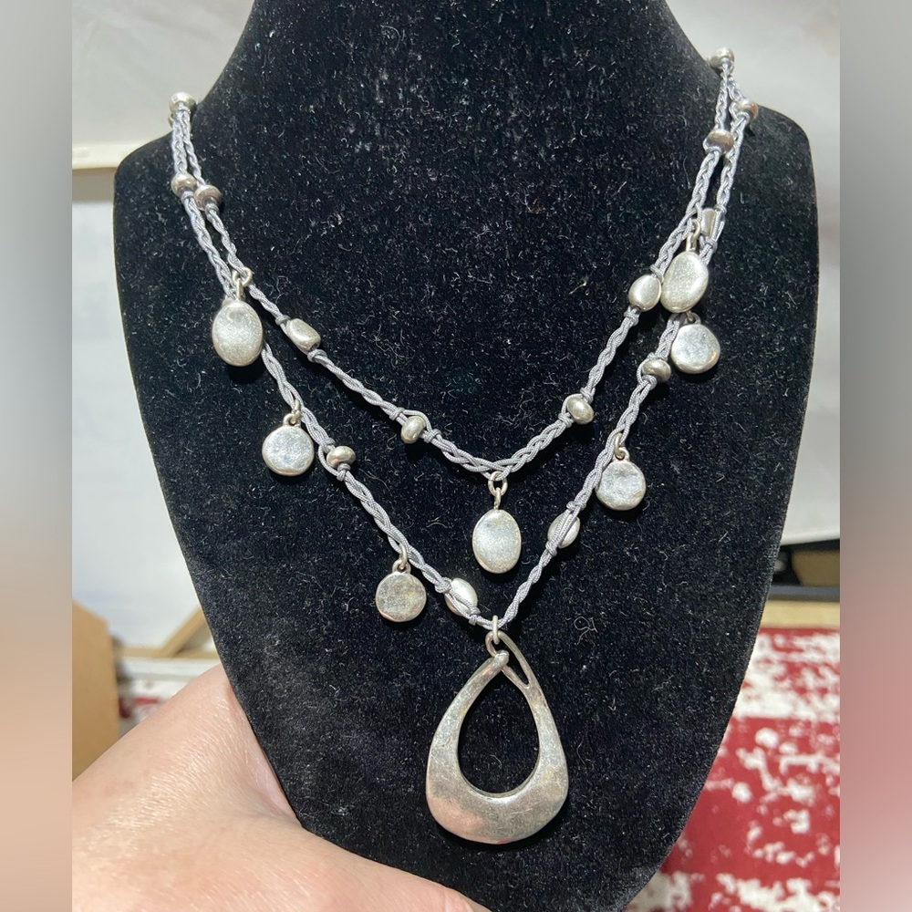 Bella Una Brushed Silver Tone Pendant Layered Necklace on Braided Grey Cord
